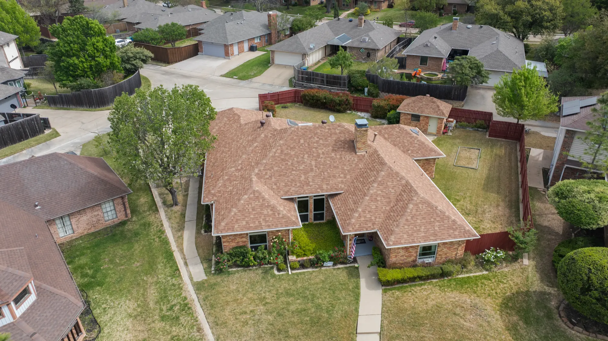 Aerial view of home and neighborhood